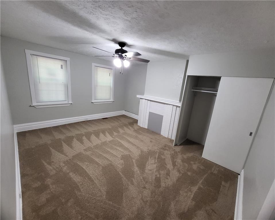 279 Nelson Run Road Pittsburgh, PA 15237 - Photo 27 of 38 a view of empty room with windows and cabinet