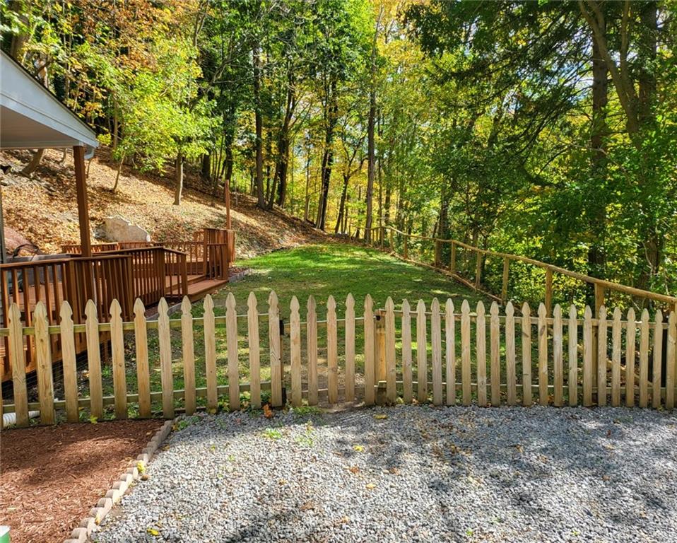 279 Nelson Run Road Pittsburgh, PA 15237 - Photo 32 of 38 a front view of a house with a garden