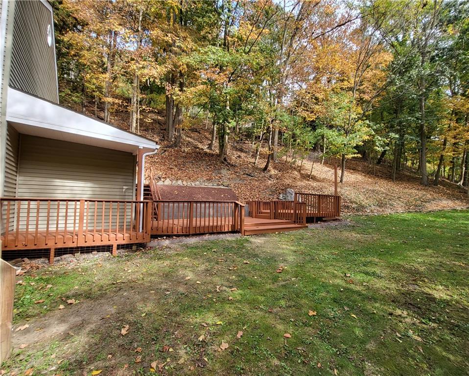 279 Nelson Run Road Pittsburgh, PA 15237 - Photo 33 of 38 a view of backyard with deck and trees