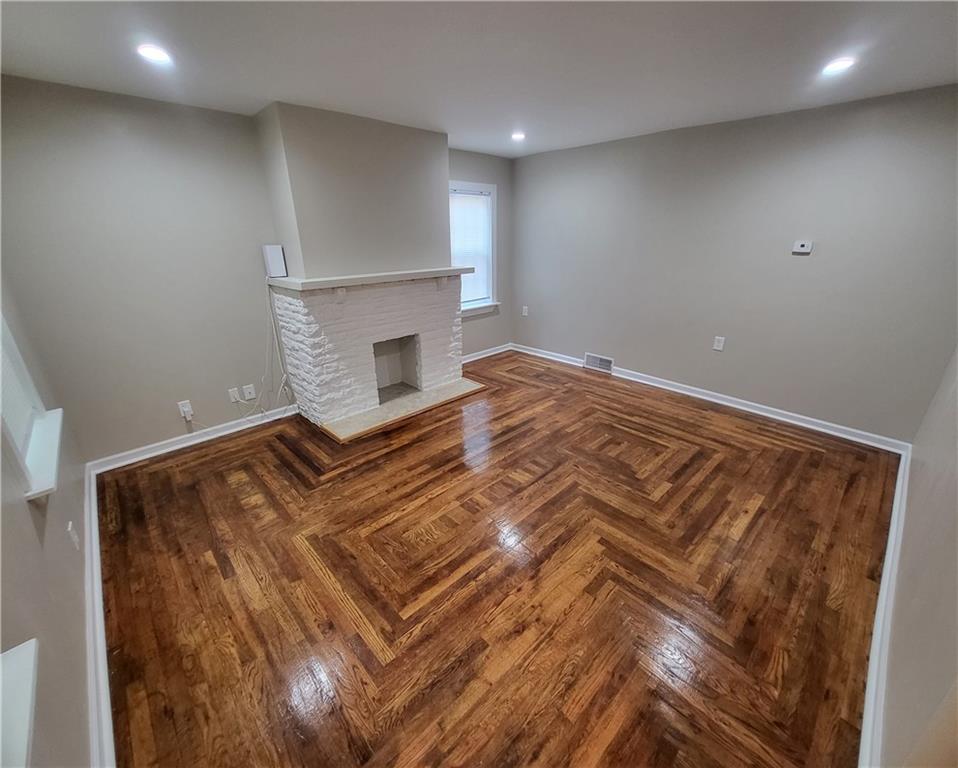 279 Nelson Run Road Pittsburgh, PA 15237 - Photo 6 of 38 a bedroom with a bed and a fireplace