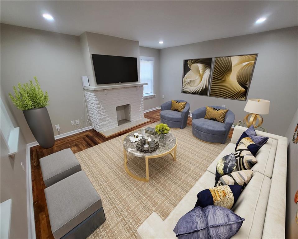 279 Nelson Run Road Pittsburgh, PA 15237 - Photo 7 of 38 a living room with furniture and a flat screen tv