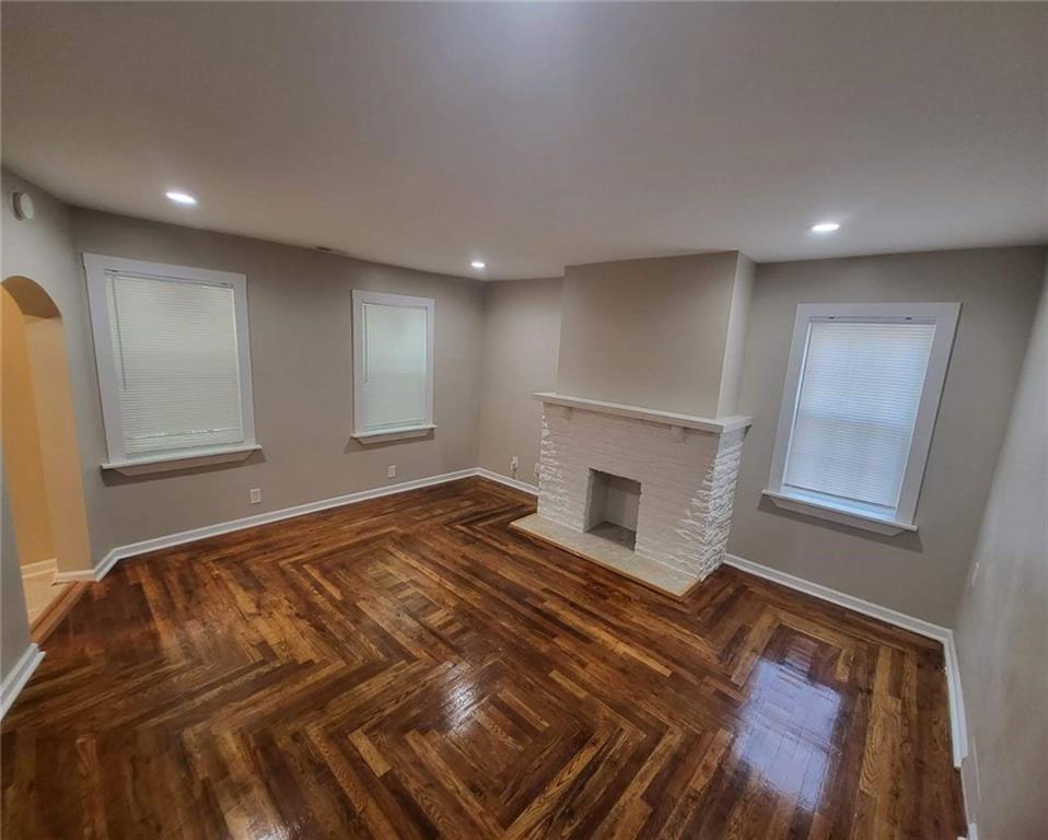 279 Nelson Run Road Pittsburgh, PA 15237 - Photo 8 of 38 a spacious bedroom with a bed and a fireplace