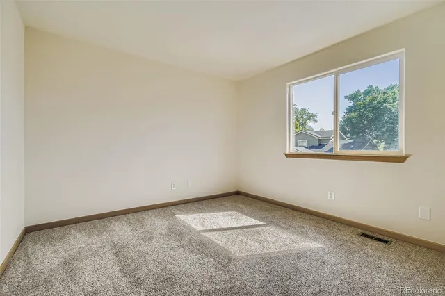 an empty room with a window