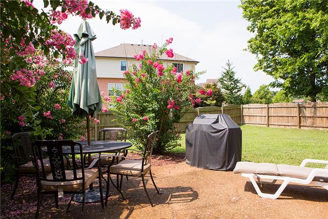 3110 Vera Valley Road Franklin, TN 37064 - Photo 12 of 17 The Back Patio Features Extra Privacy by the Surrounding, Lovely Crepe Myrtles.