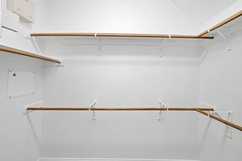 a view of a room with racks on the wall