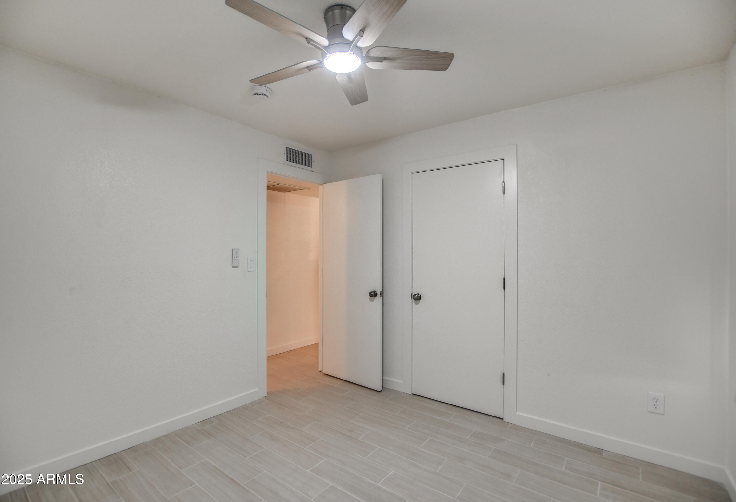 4870 West Almeria Road Phoenix, AZ 85035 - Photo 14 of 22 a view of an empty room