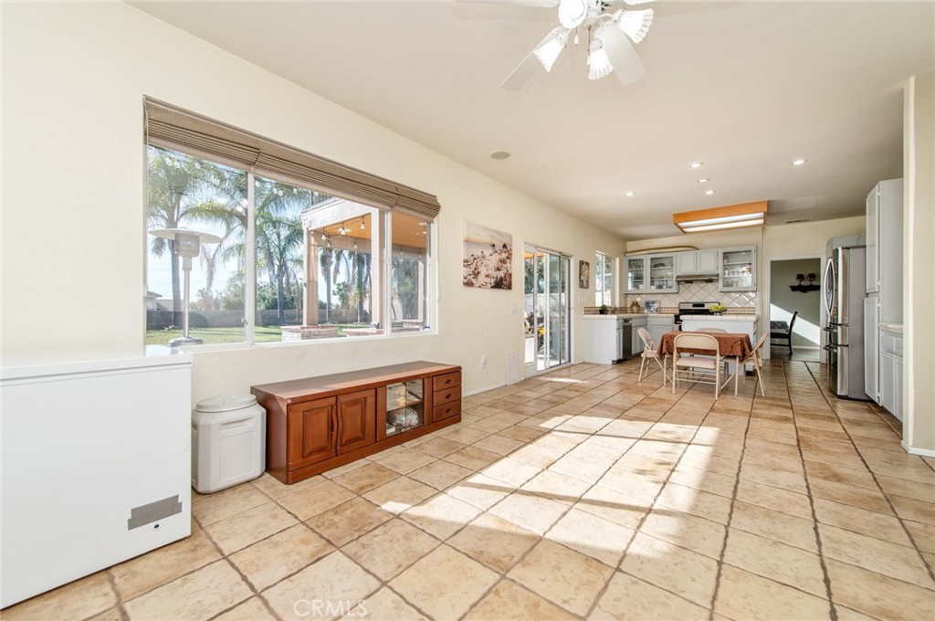 9111 Hamilton Street Rancho Cucamonga, CA 91701 - Photo 12 of 46 a living room with furniture and a large window