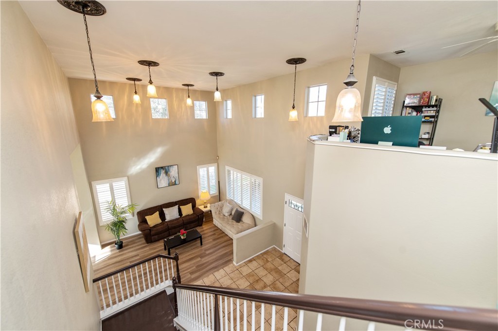 9111 Hamilton Street Rancho Cucamonga, CA 91701 - Photo 23 of 46 a view of a living room and dining room