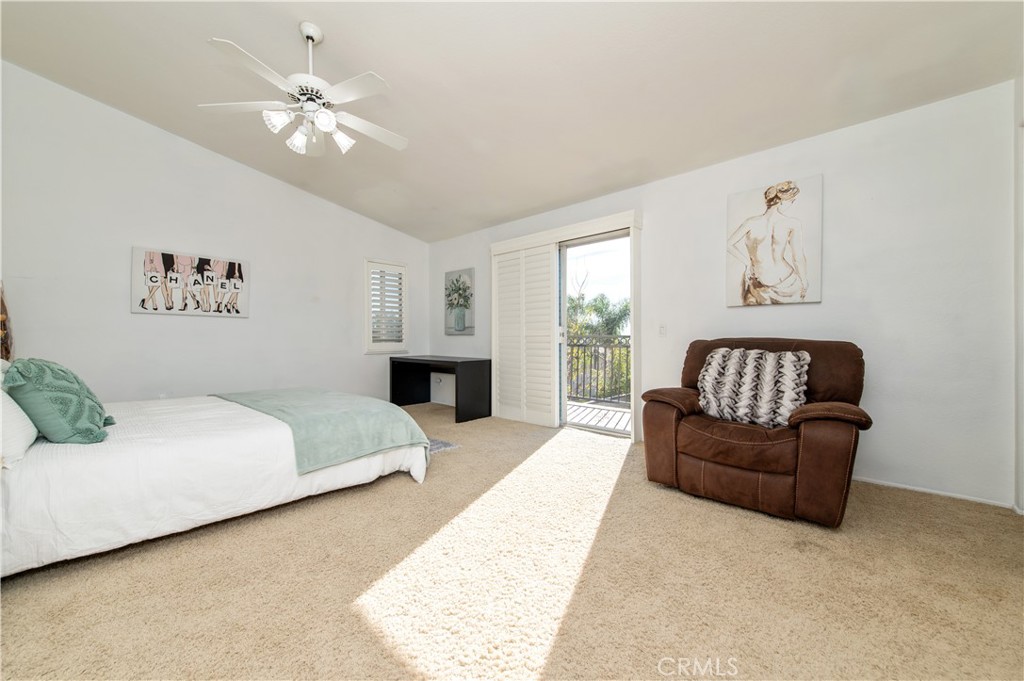 9111 Hamilton Street Rancho Cucamonga, CA 91701 - Photo 26 of 46 a spacious bedroom with a bed and a couch