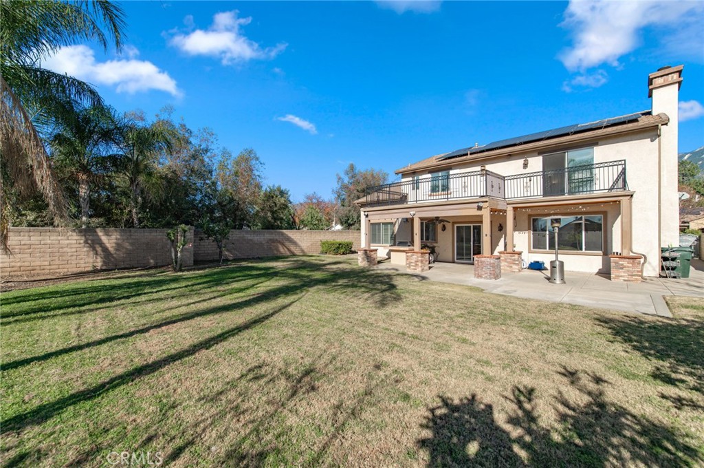 9111 Hamilton Street Rancho Cucamonga, CA 91701 - Photo 42 of 46 a view of a house with backyard and sitting area