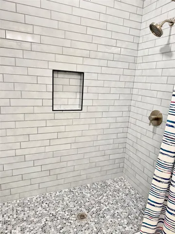 a view of a balcony with wooden floor