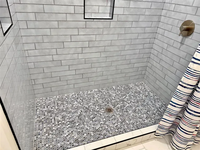 a view of balcony with wooden floor