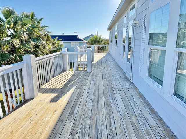 a view of a balcony with chairs