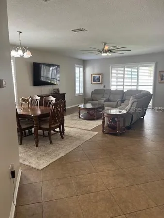 a living room with furniture and window