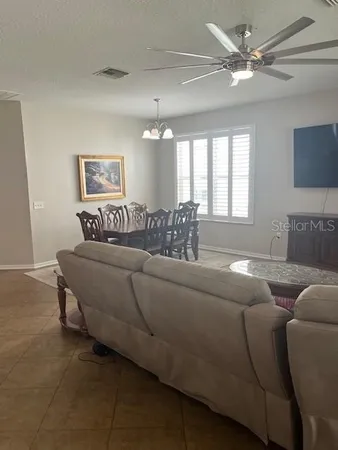 a living room with furniture and a couch