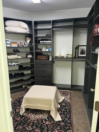 a bathroom with a bathtub and a window