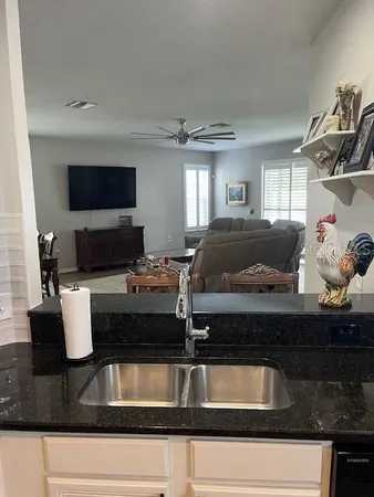 a kitchen with a stove and a microwave