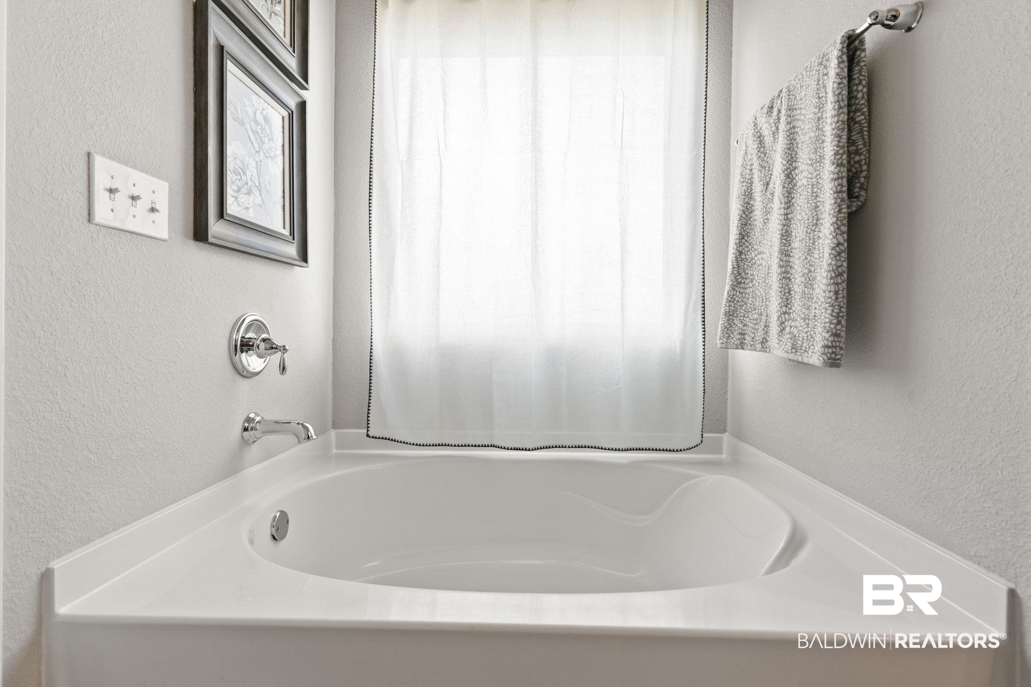 31650 Memphis Loop Daphne, AL 36527 - Photo 30 of 68 Bathroom with a textured wall and a garden tub