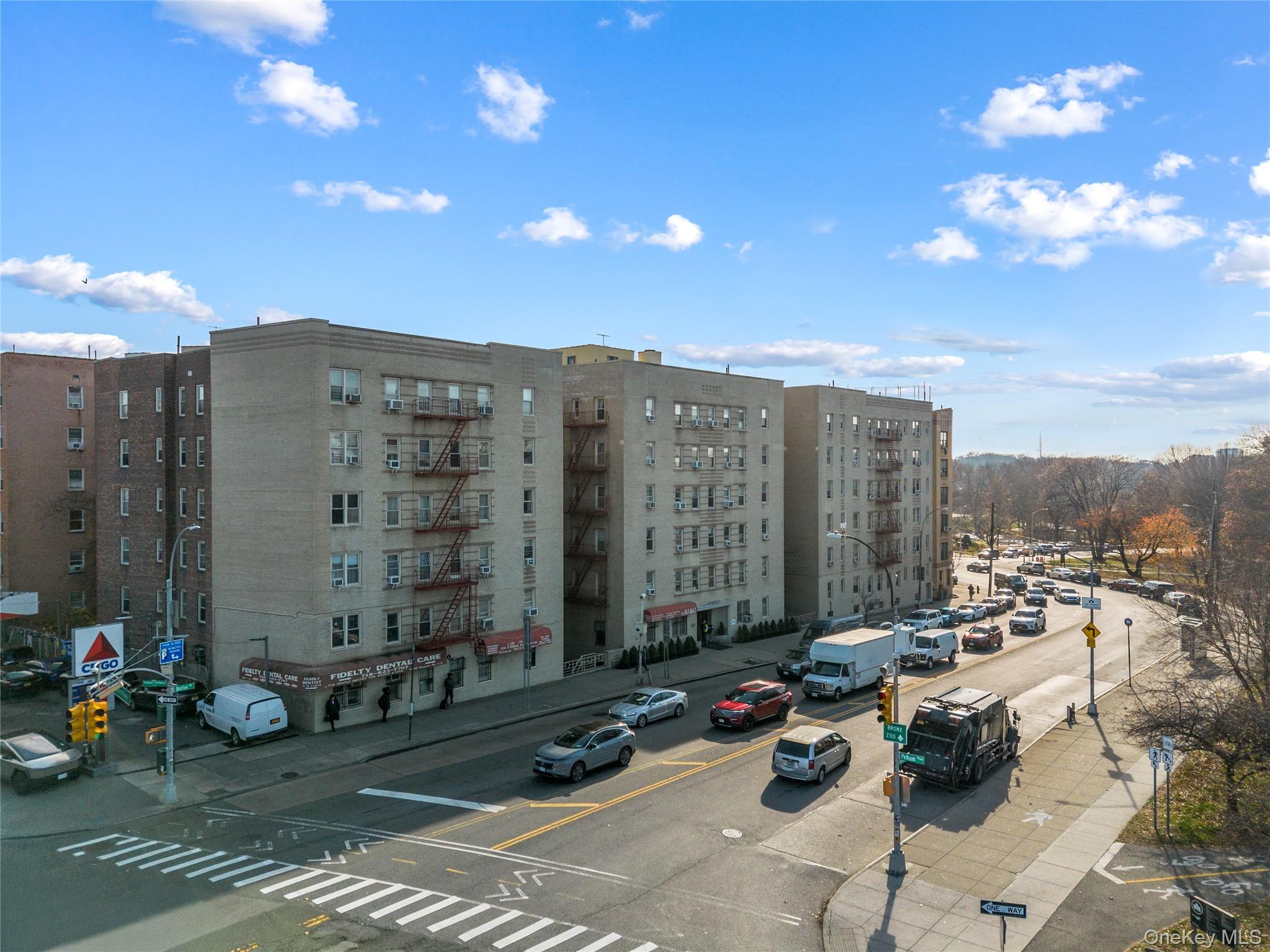 a view of a patio with swimming pool and table and chairs