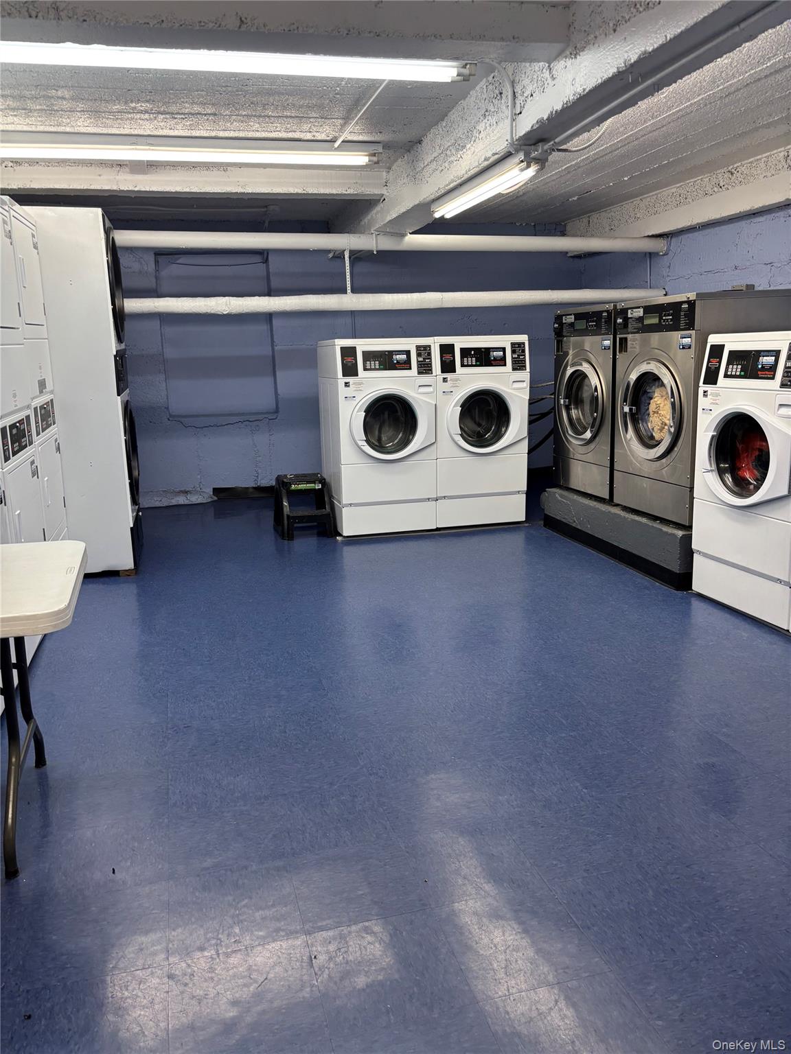 2190 Boston Road, Unit 2J Bronx, NY 10462 - Photo 2 of 4 a utility room with washer and dryer