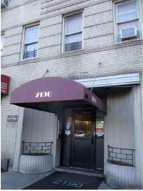 2190 Boston Road, Unit 2J Bronx, NY 10462 - Photo 4 of 4 a front view of a building with glass windows