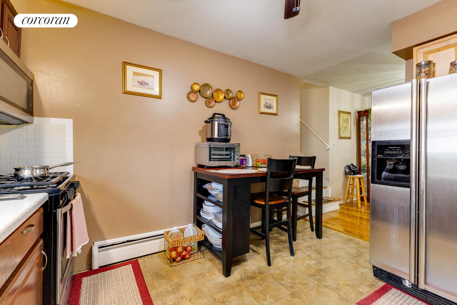 137-17 160th Street Queens, NY 11434 - Photo 13 of 14 a view of a dining room with furniture