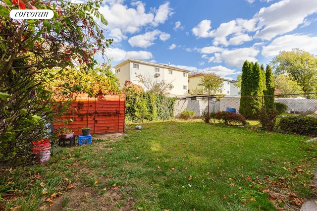 a view of a bench in front of house