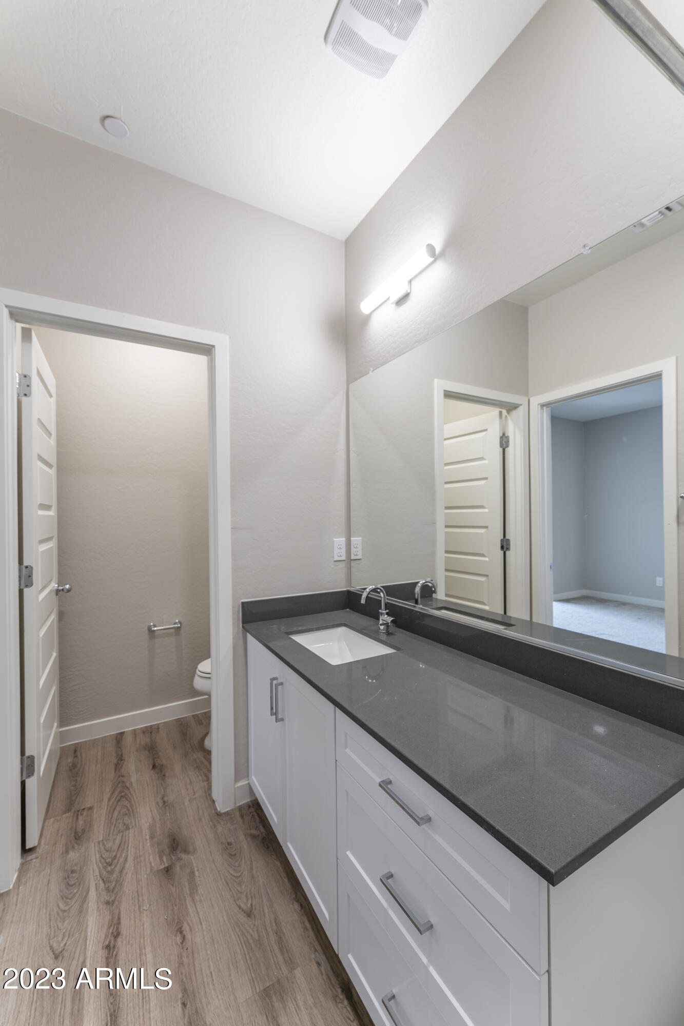 432 South 32nd Street, Unit 104 Mesa, AZ 85204 - Photo 43 of 75 a bathroom with a sink and a mirror