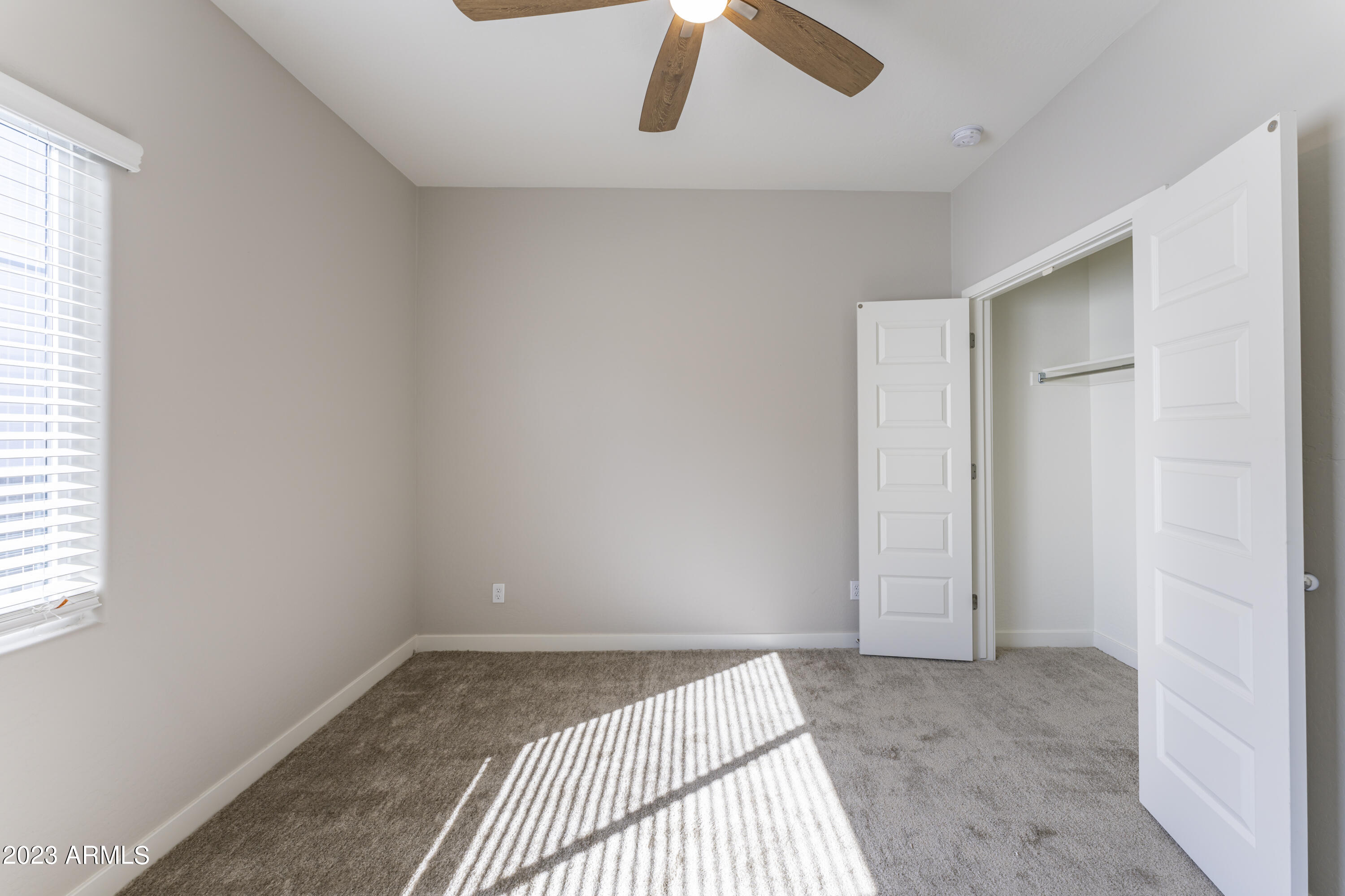 432 South 32nd Street, Unit 104 Mesa, AZ 85204 - Photo 46 of 75 an empty room with a empty space and window
