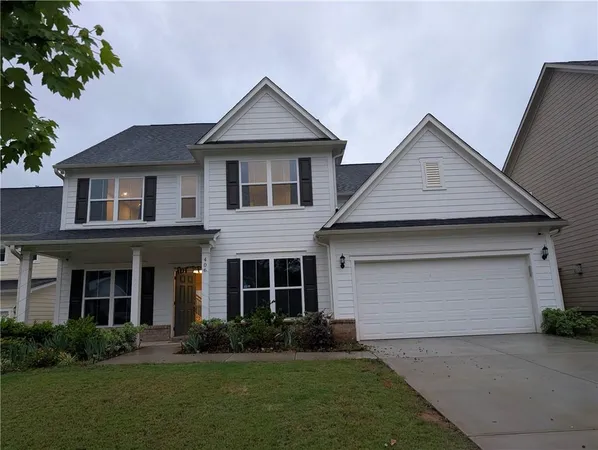 front view of a house with a yard