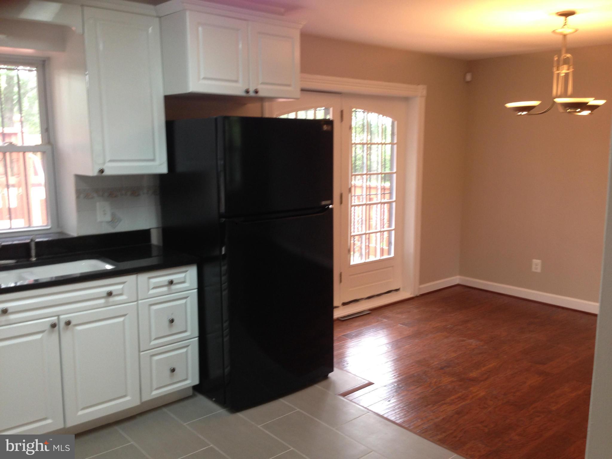 9501 Juliette Drive Clinton, MD 20735 - Photo 4 of 27 a kitchen with cabinets and window