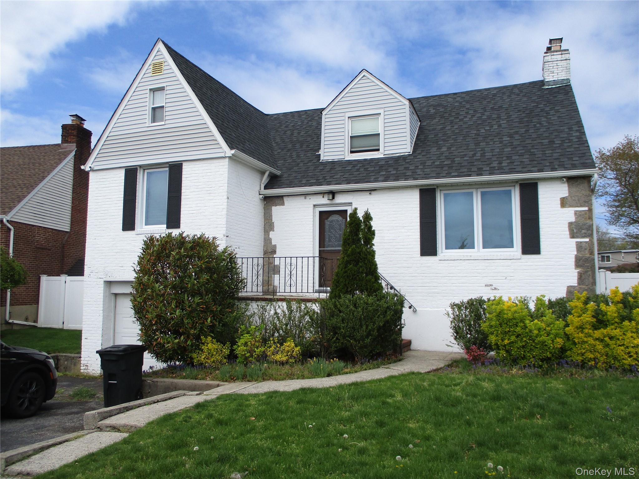 19 Acorn Road East Rockaway, NY 11518 - Photo 1 of 16 a front view of a house with a yard