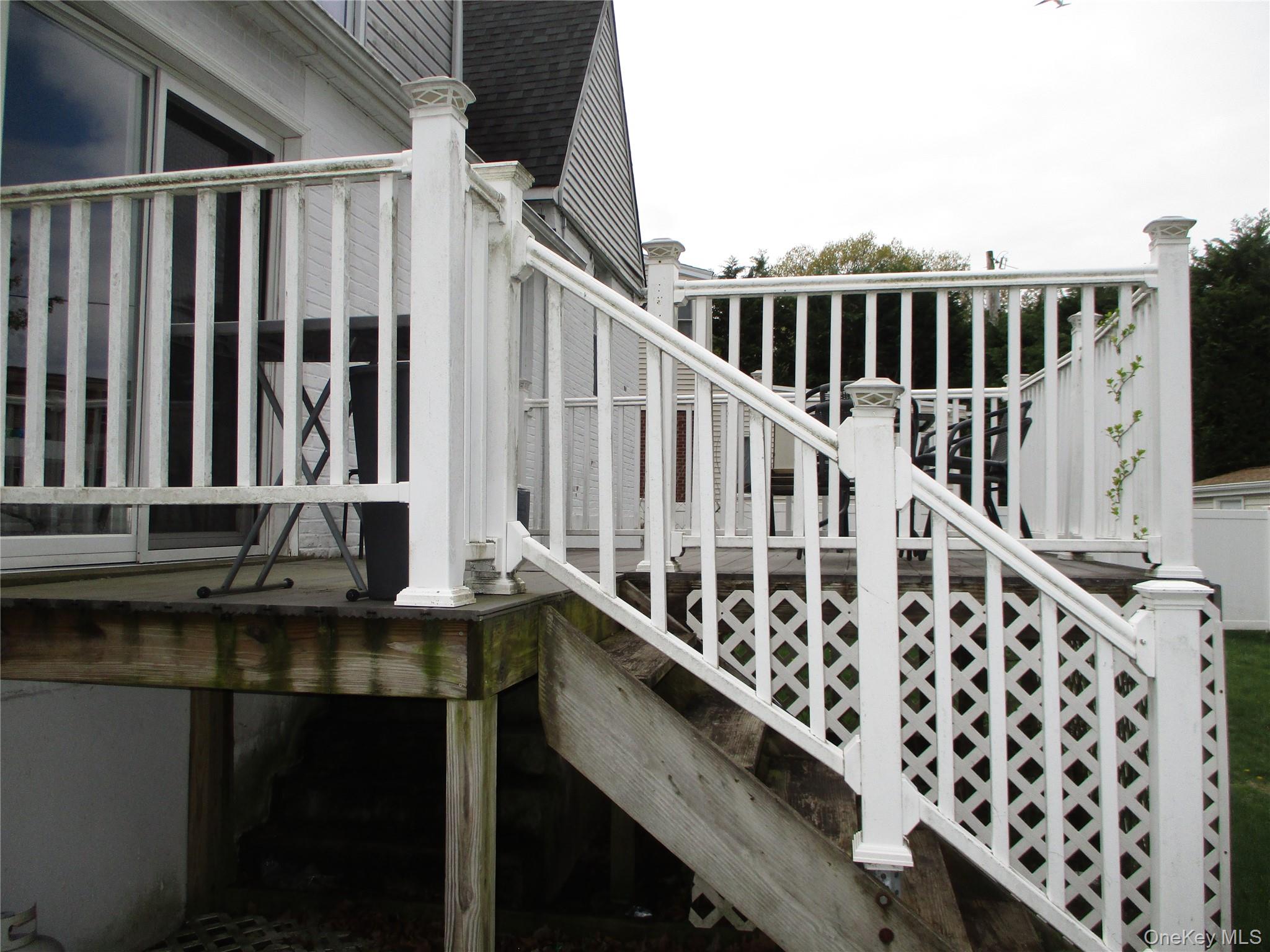 19 Acorn Road East Rockaway, NY 11518 - Photo 14 of 16 a view of balcony with wooden floor