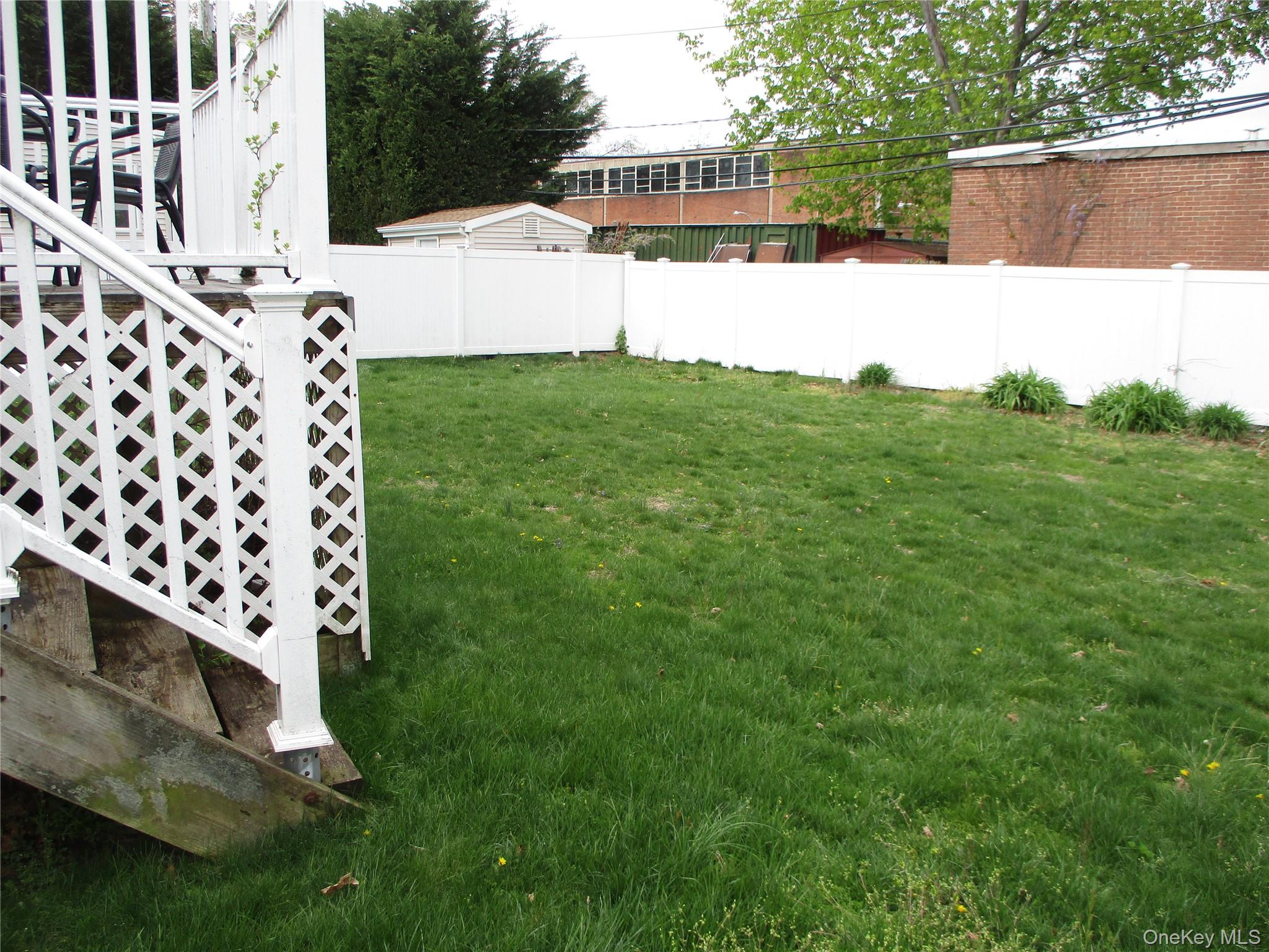 19 Acorn Road East Rockaway, NY 11518 - Photo 16 of 16 a view of a house with a yard
