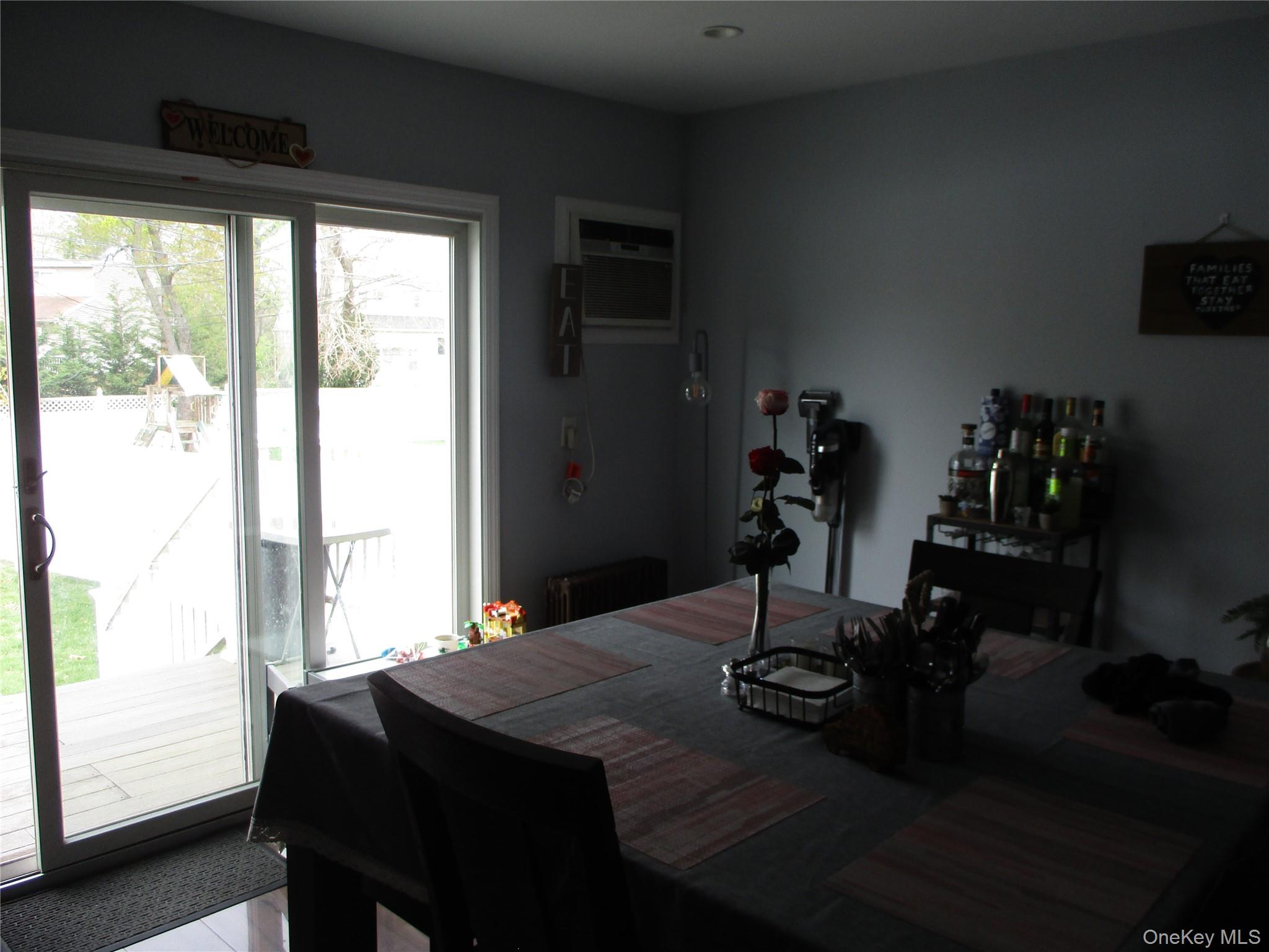19 Acorn Road East Rockaway, NY 11518 - Photo 2 of 16 a view of a workspace with furniture and a window