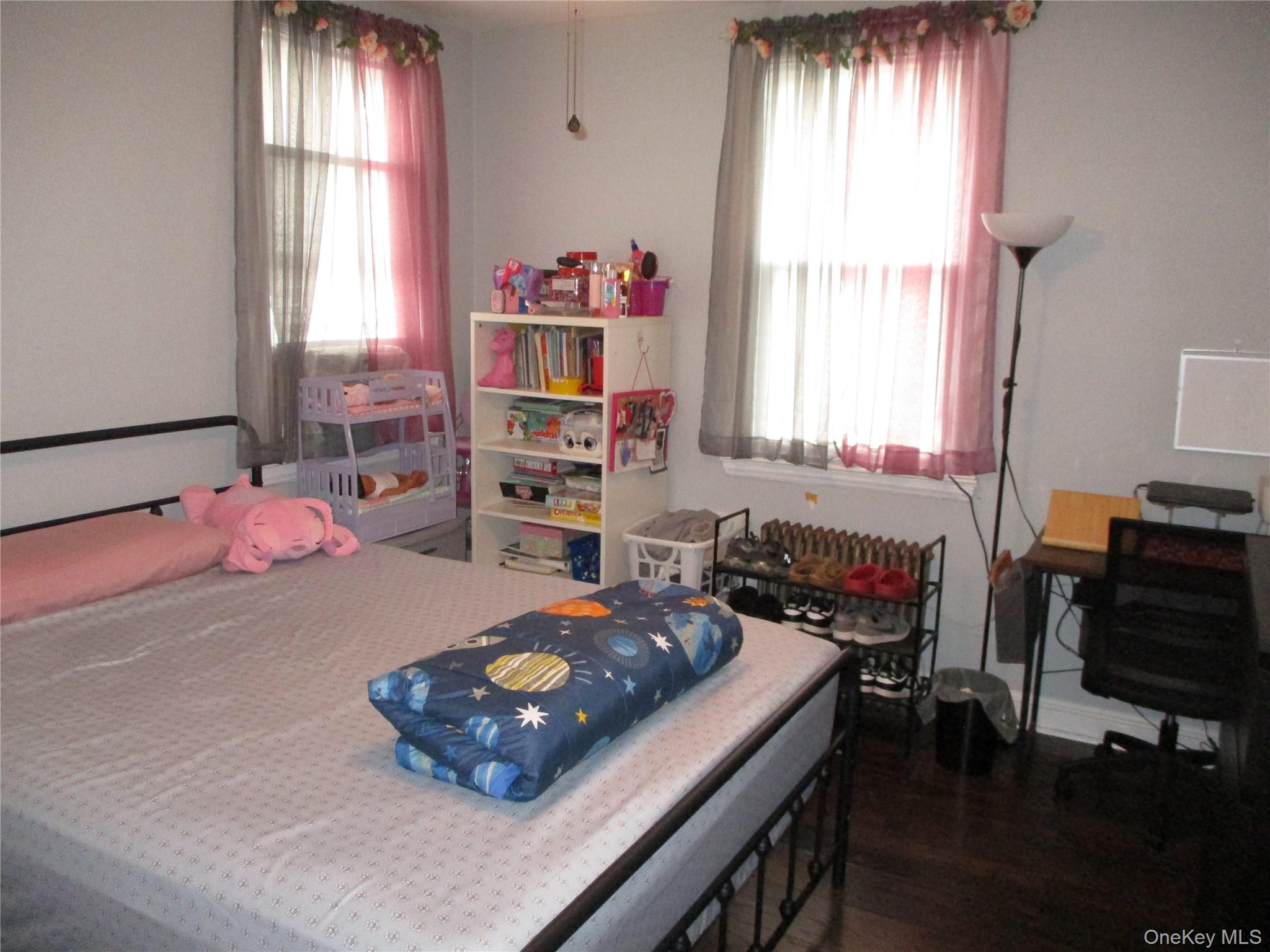 19 Acorn Road East Rockaway, NY 11518 - Photo 5 of 16 a room with furniture and a window