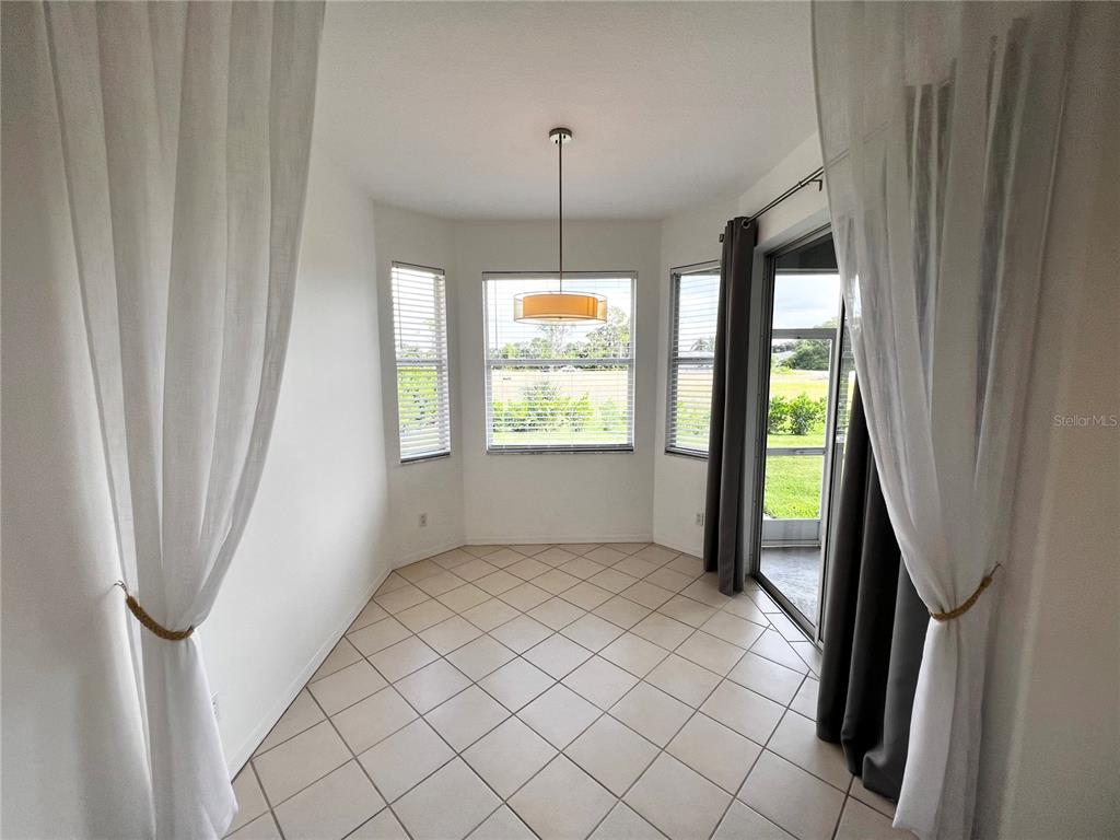 7463 Ridge Road Sarasota, FL 34238 - Photo 17 of 30 a view of an empty room with a window