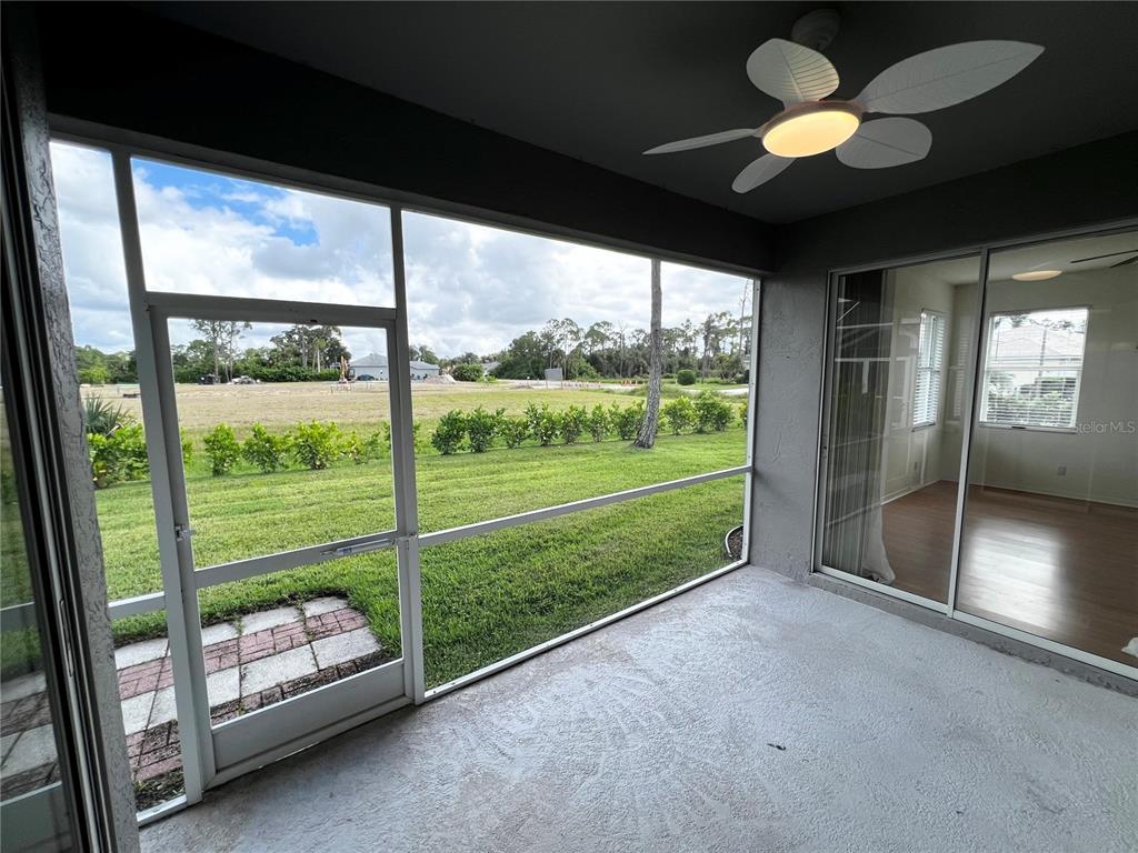 7463 Ridge Road Sarasota, FL 34238 - Photo 25 of 30 a view of a room with porch and wooden floor