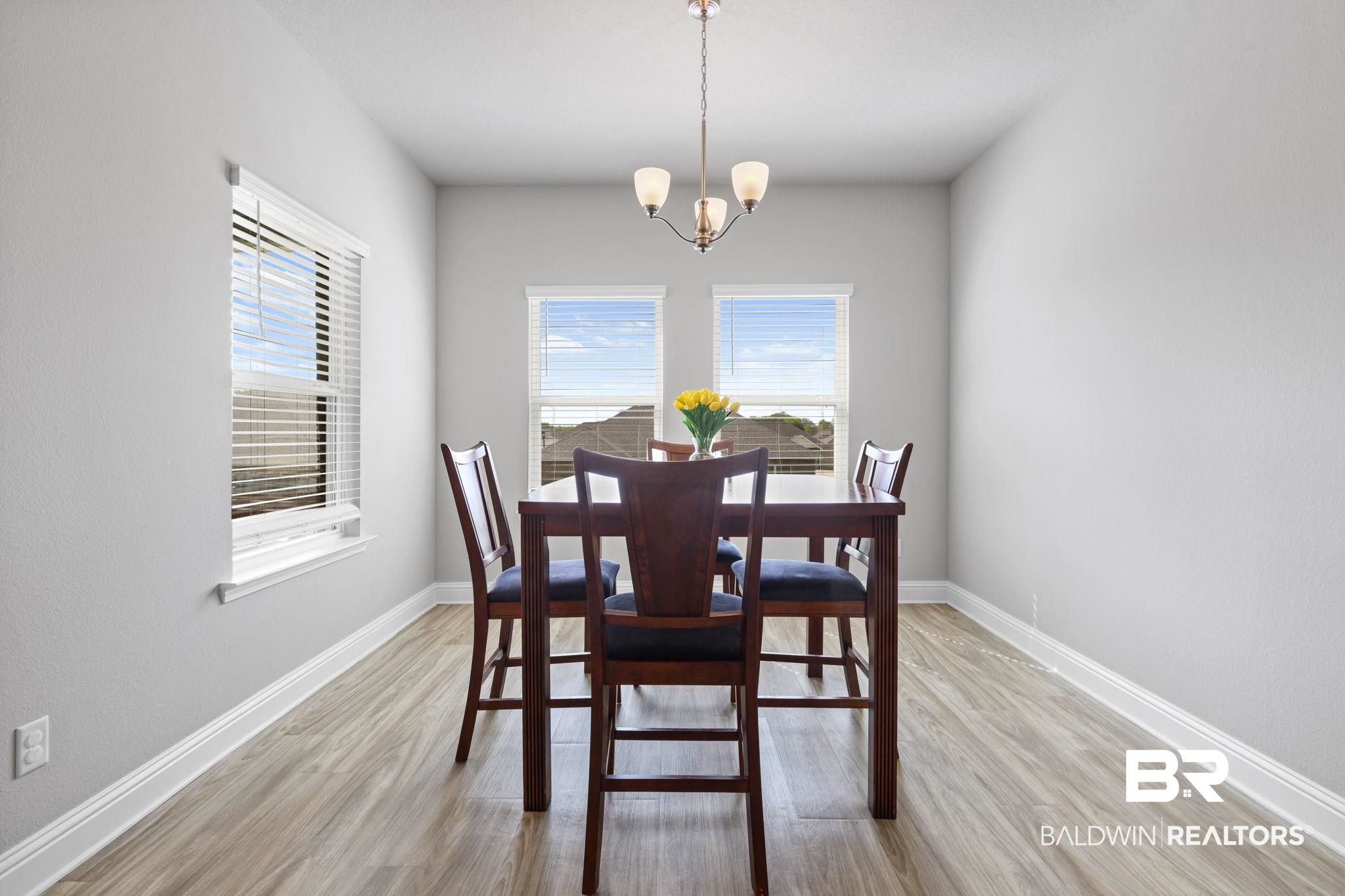 2183 Meadowview Loop Semmes, AL 36575 - Photo 40 of 58 Dining area with hanging lights and light wood-style flooring