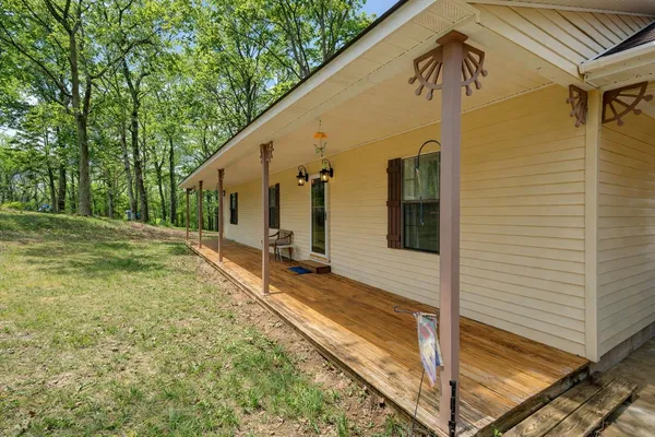 a backyard of a house with seating space