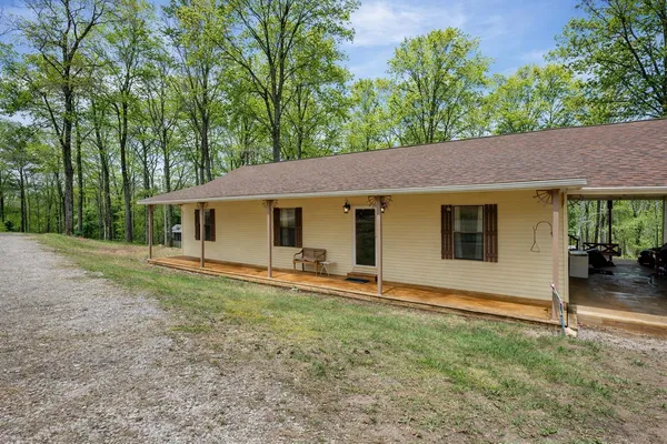 front view of a house with a yard