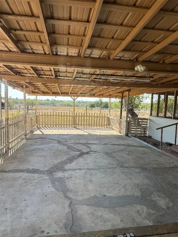 a view of an empty room with a couch