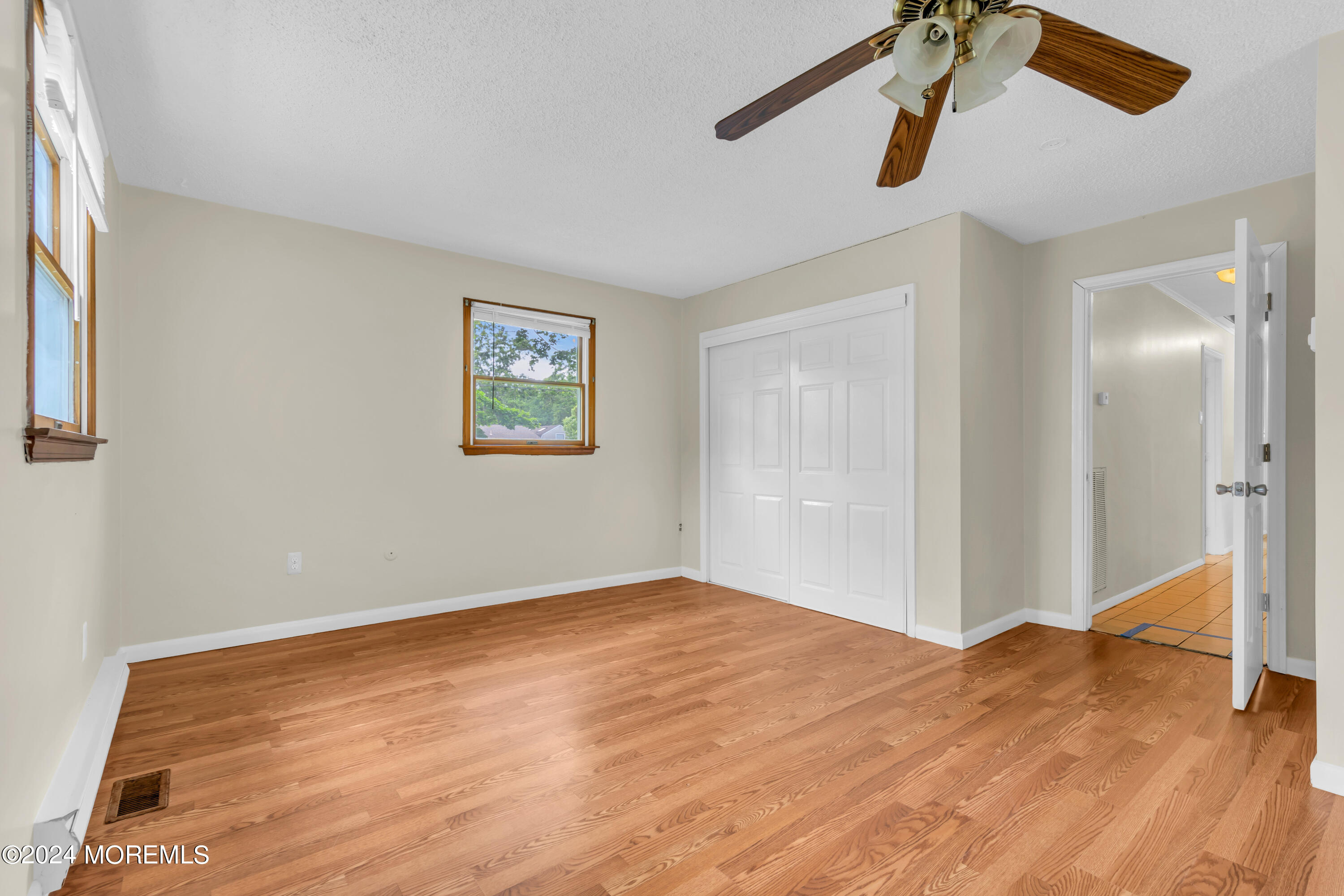 108 Jericho Road Tuckerton, NJ 08087 - Photo 13 of 24 a view of empty room with wooden floor