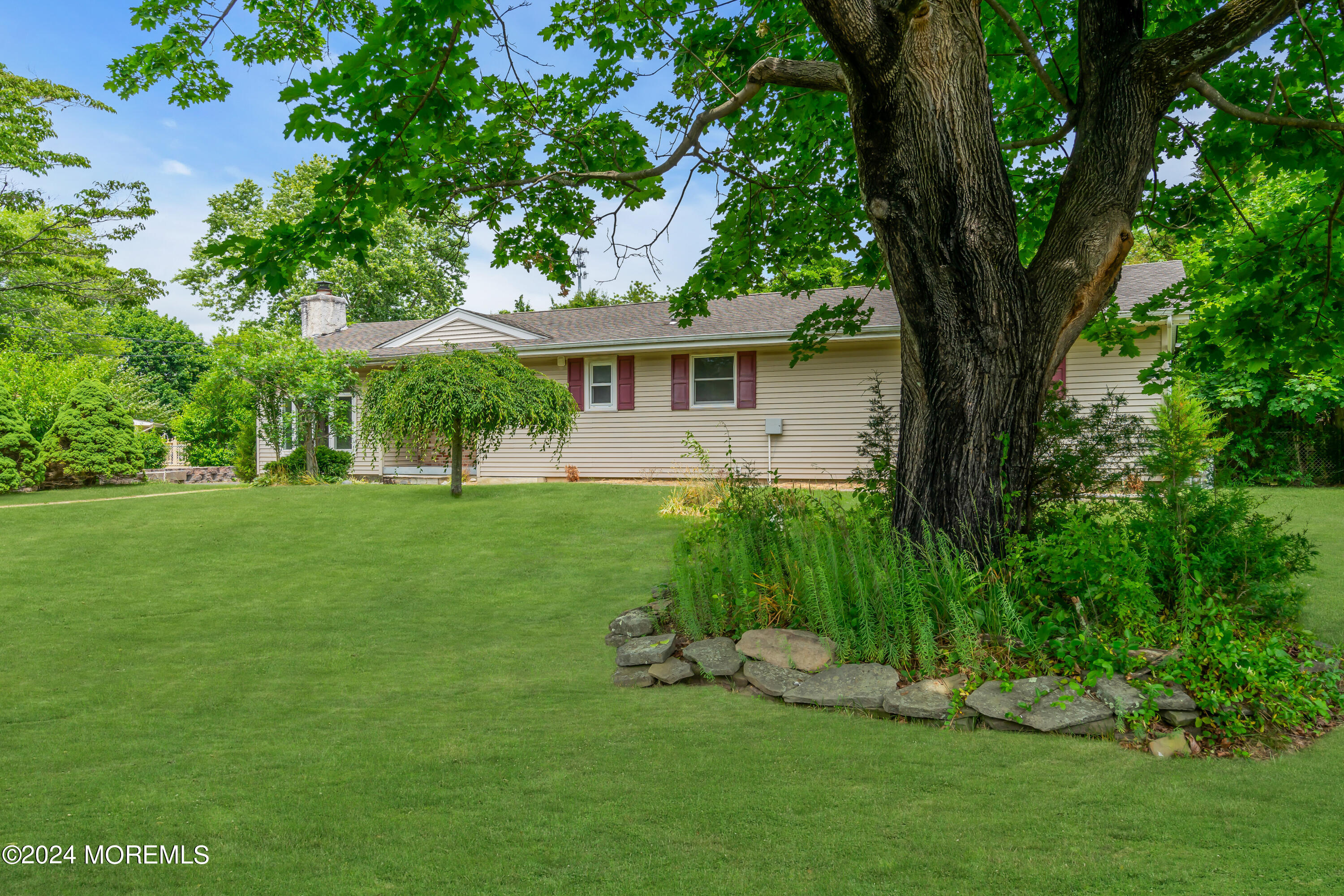 108 Jericho Road Tuckerton, NJ 08087 - Photo 2 of 24 a view of a house with a backyard