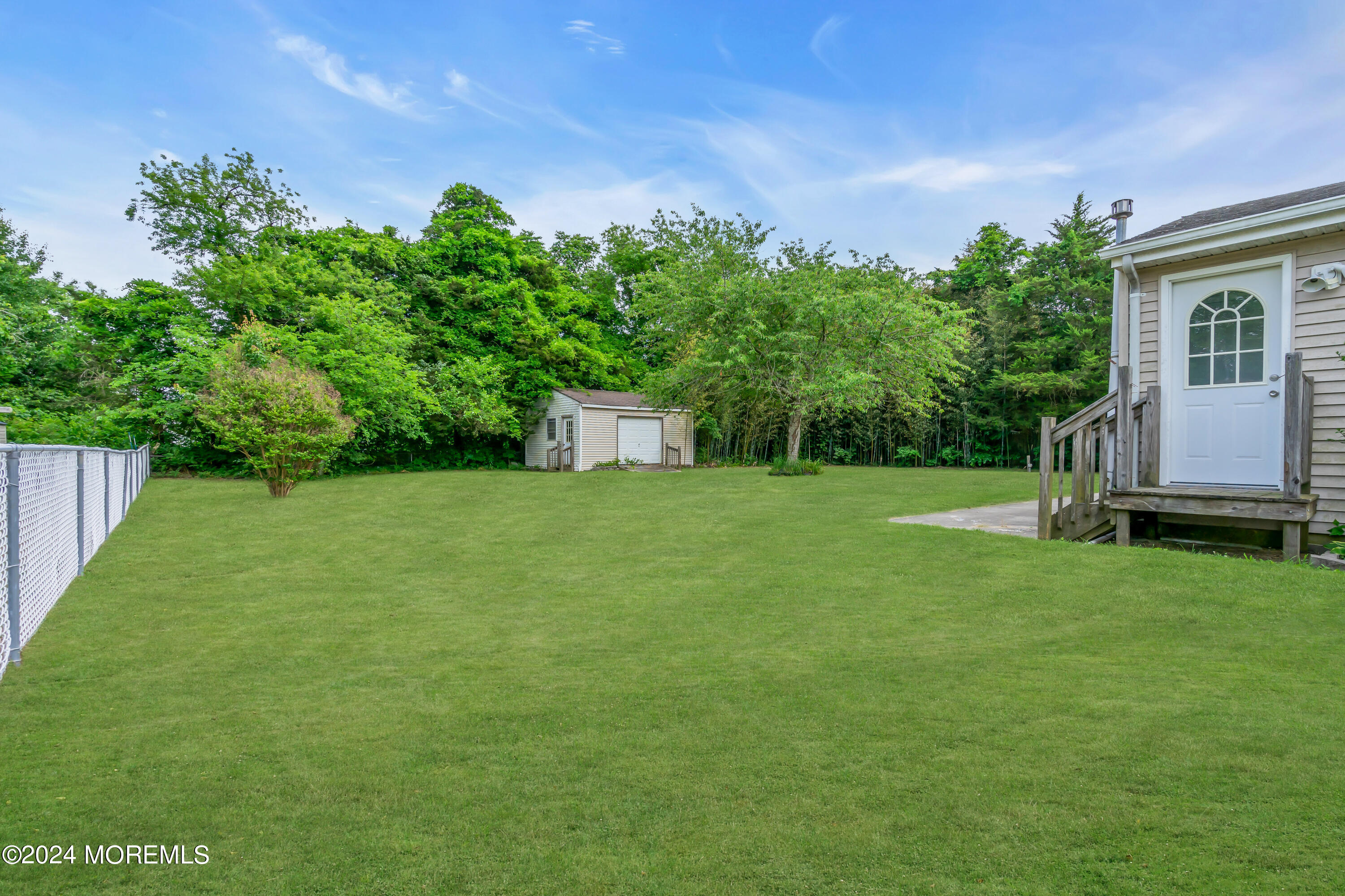 108 Jericho Road Tuckerton, NJ 08087 - Photo 23 of 24 a view of a backyard with a garden