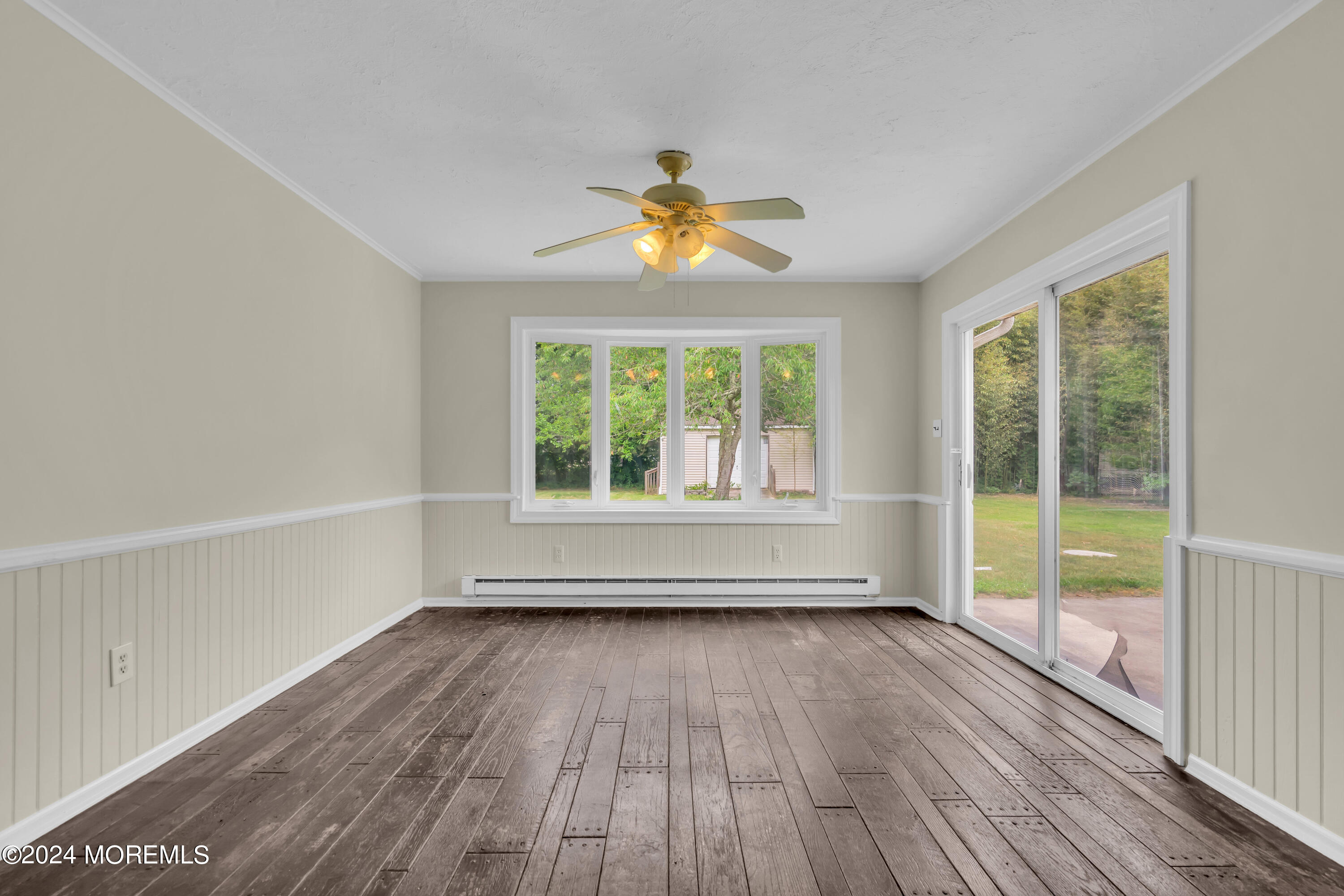 108 Jericho Road Tuckerton, NJ 08087 - Photo 7 of 24 wooden floor in an empty room with a window