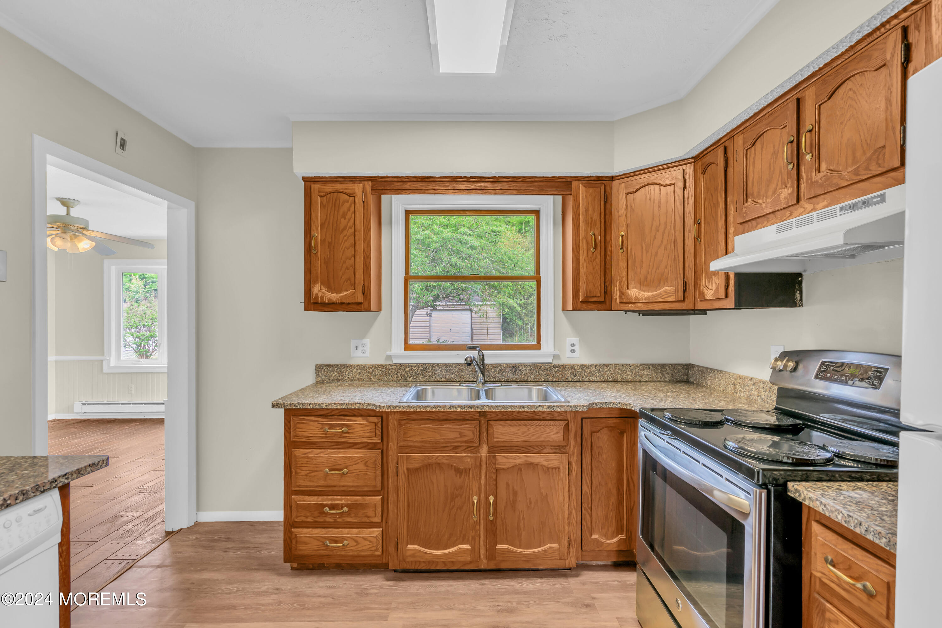 108 Jericho Road Tuckerton, NJ 08087 - Photo 9 of 24 a kitchen with stainless steel appliances granite countertop a sink stove and cabinets