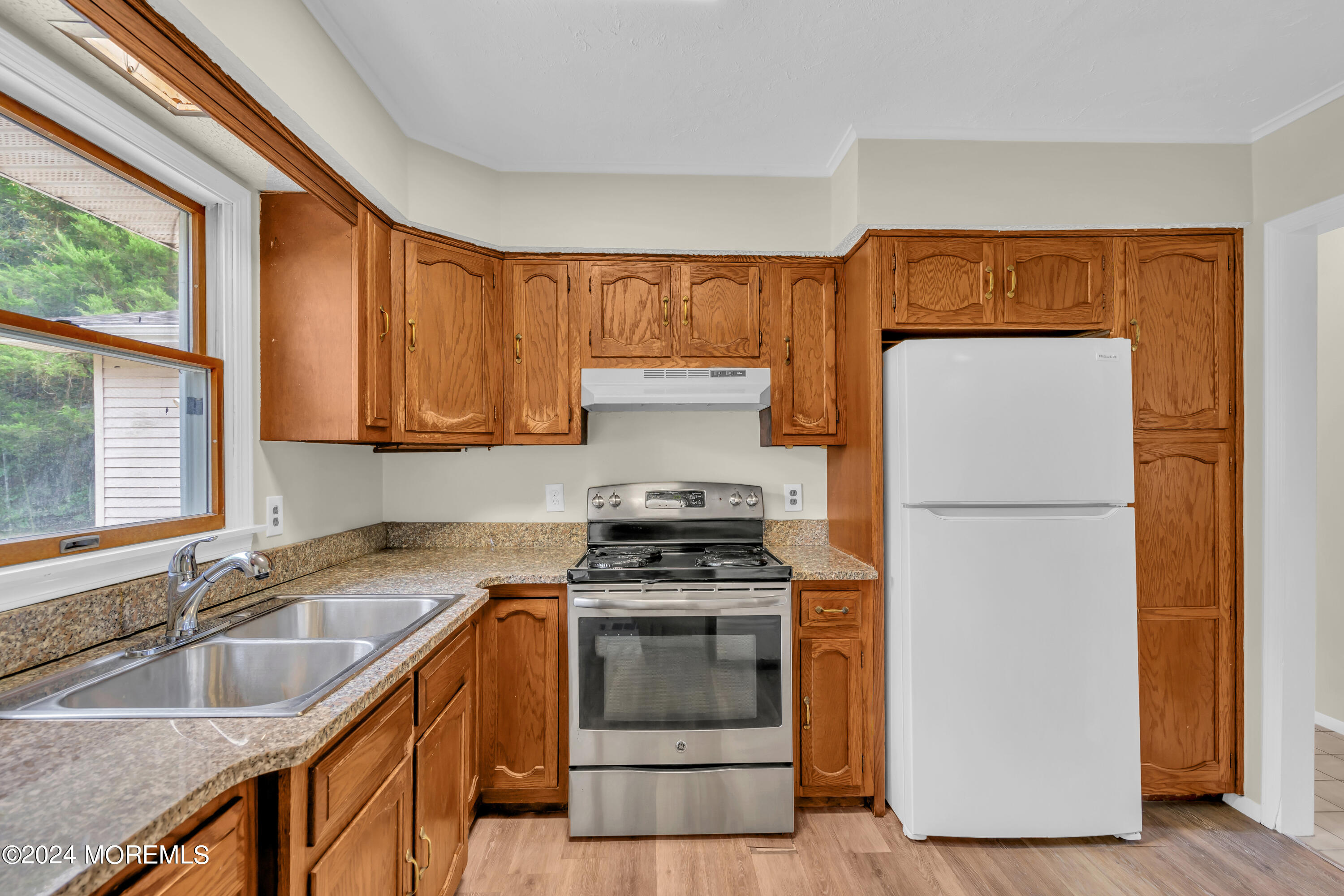 108 Jericho Road Tuckerton, NJ 08087 - Photo 10 of 24 a kitchen with a sink a refrigerator and a window