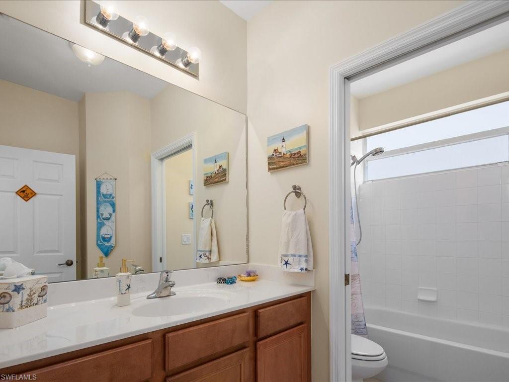 1646 Birdie Drive Naples, FL 34120 - Photo 28 of 37 Downstairs full bath adjacent to bedroom...