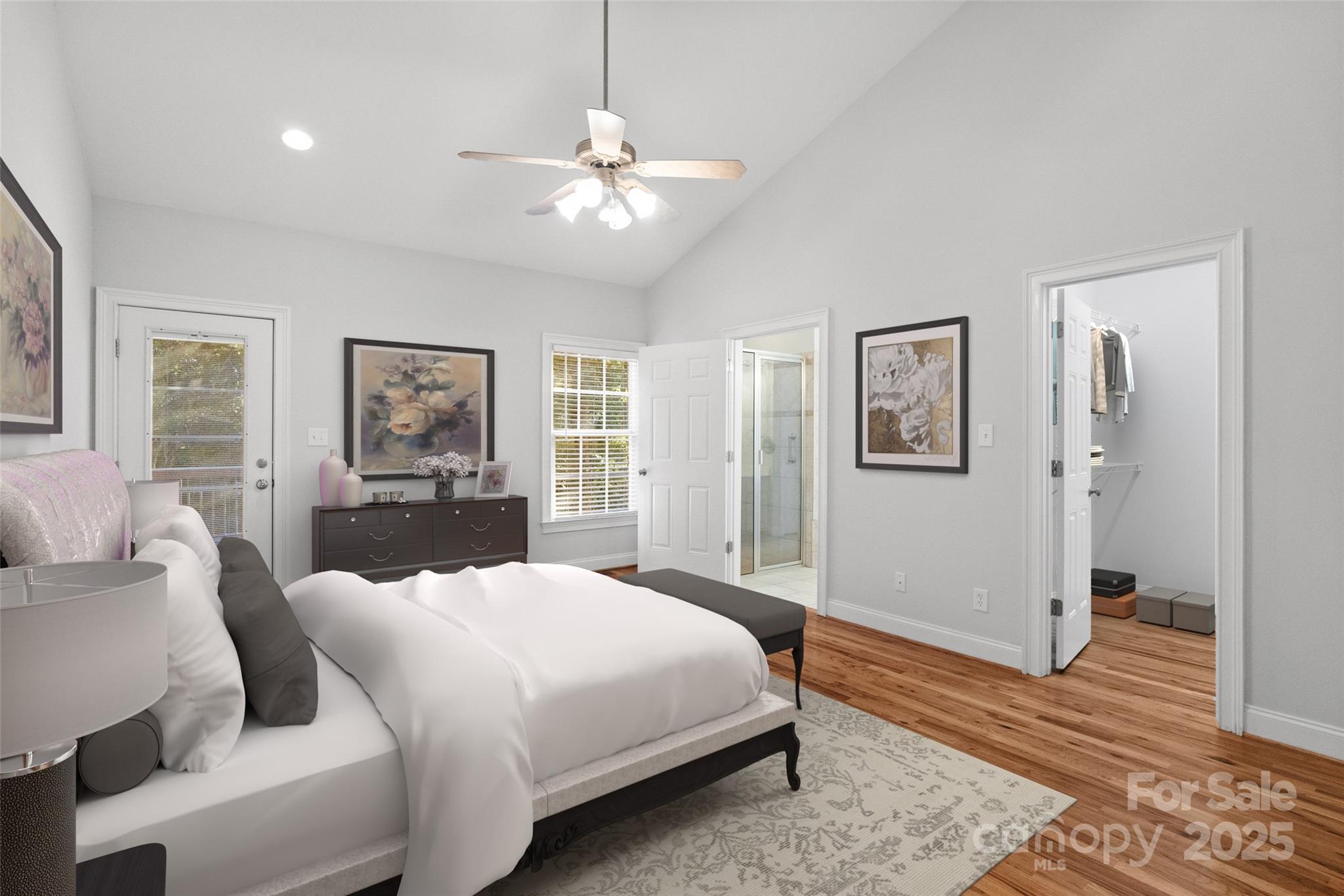 3310 Millstone Creek Road Lancaster, SC 29720 - Photo 18 of 45 a large bedroom with a bed and wooden floor